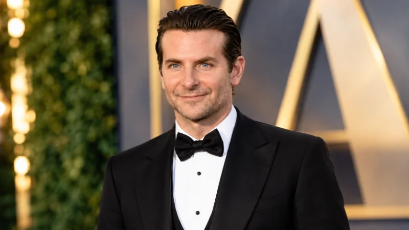 Bradley Cooper net worth article featured photo at a film premiere